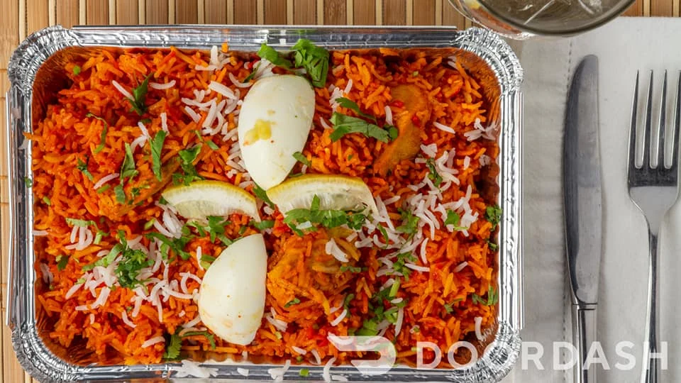 Fragrant chicken biryani with basmati rice at Dynamic Duo Saskatoon